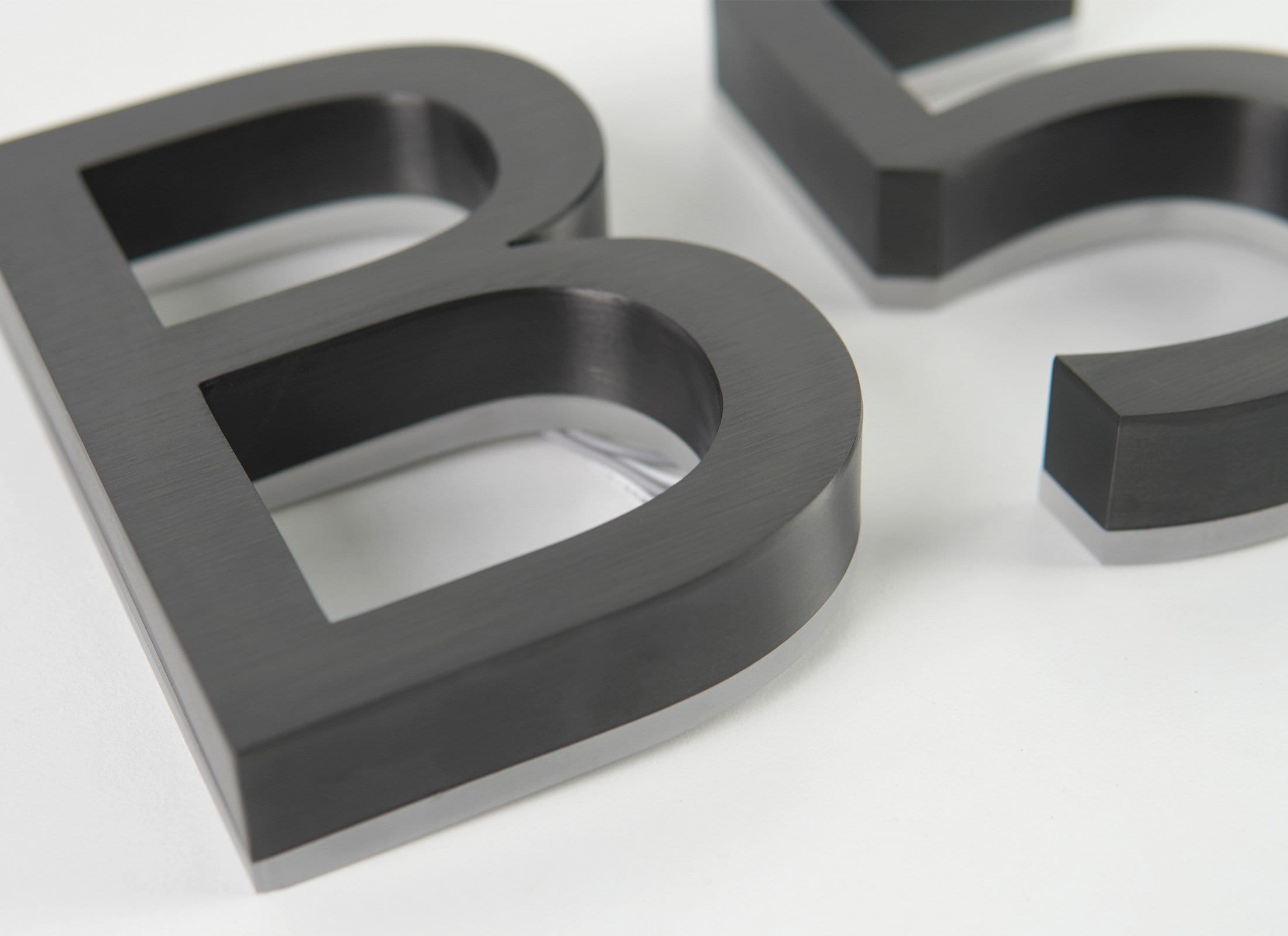 Custom LED Halo Backlit Letters – Metal Letters with Acrylic Backplate