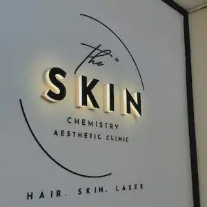Supporting project view - custom champagne gold halo backlit logo signs