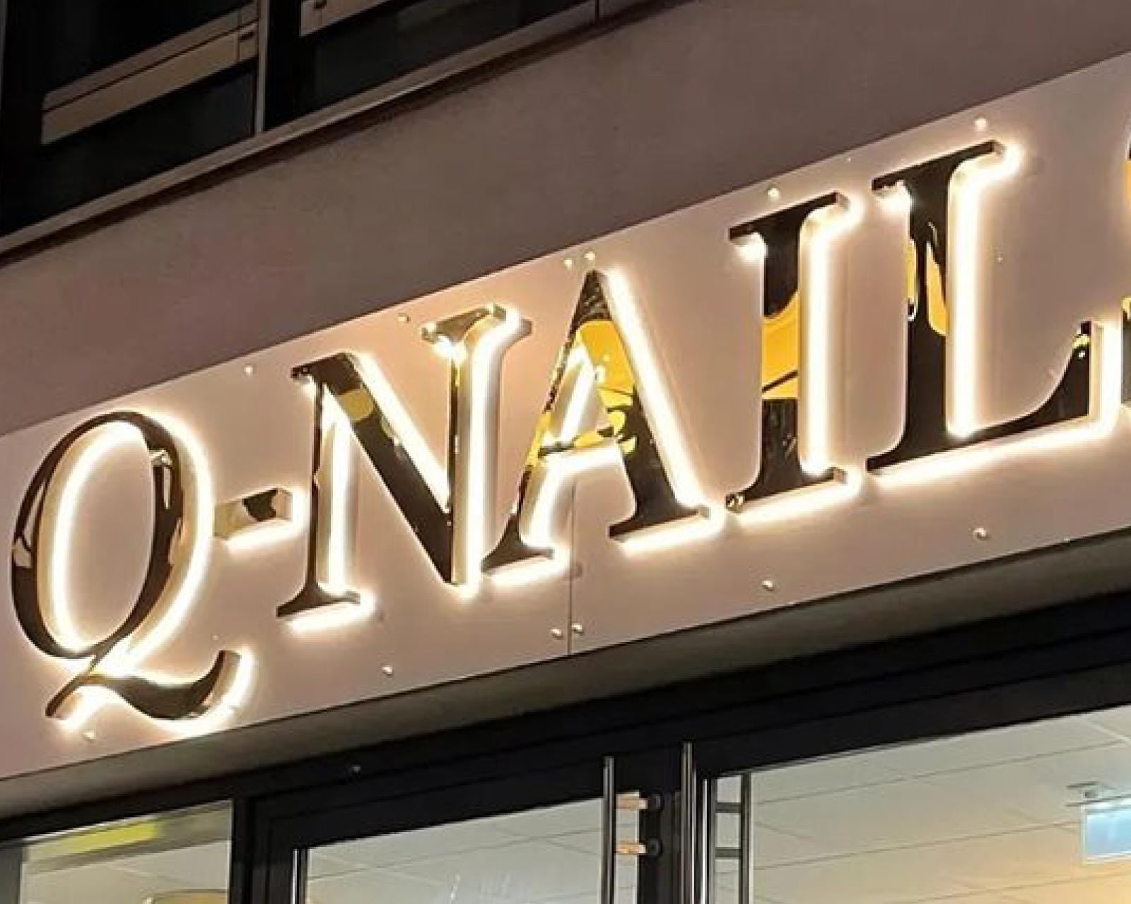 Installed main scene - custom metal halo backlit logo signs for storefronts and reception walls