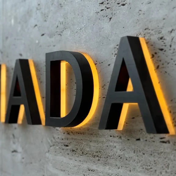 Supporting project view - custom metal halo backlit logo signs for storefronts and reception walls