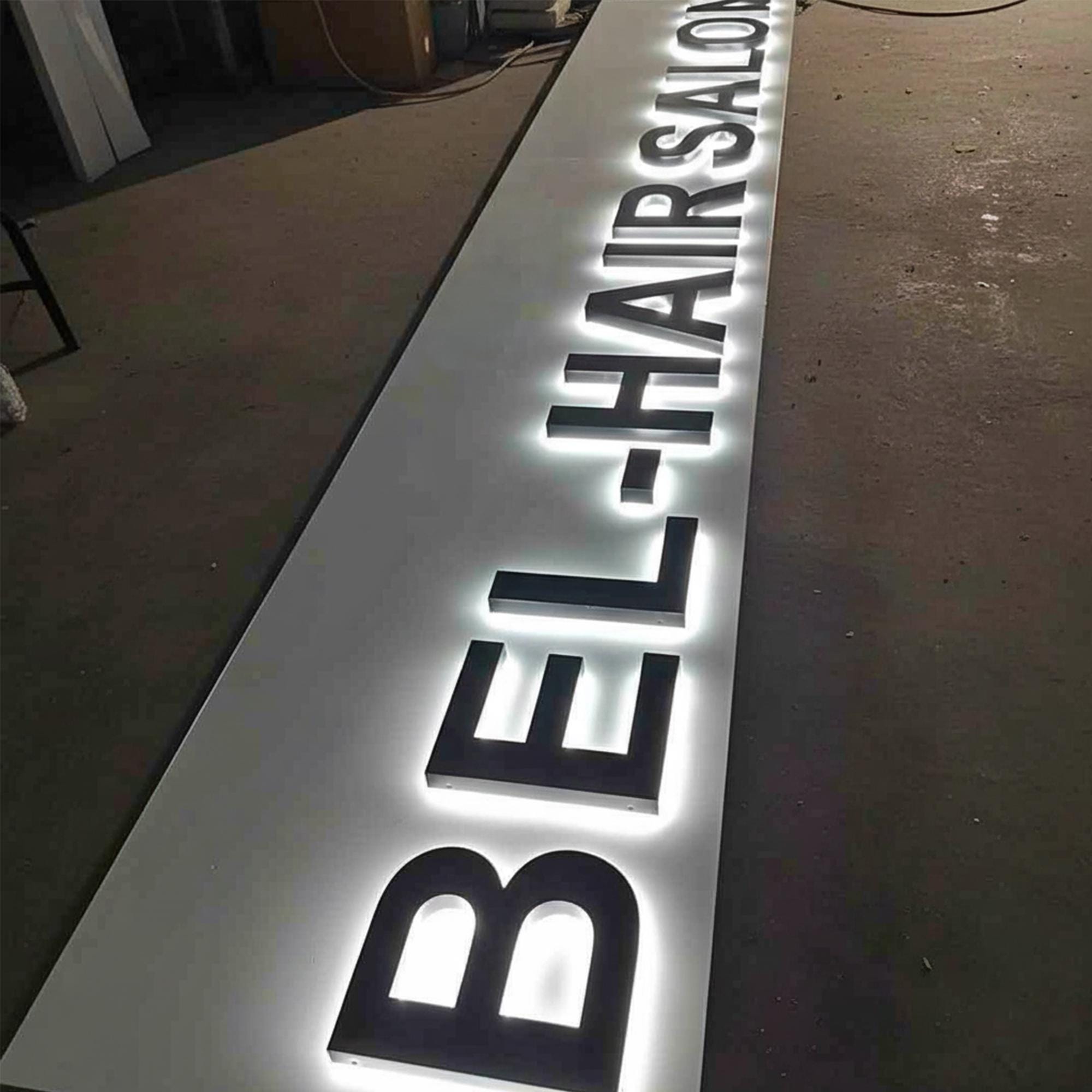 Supporting project view - custom salon, clinic, and office wall logo signs